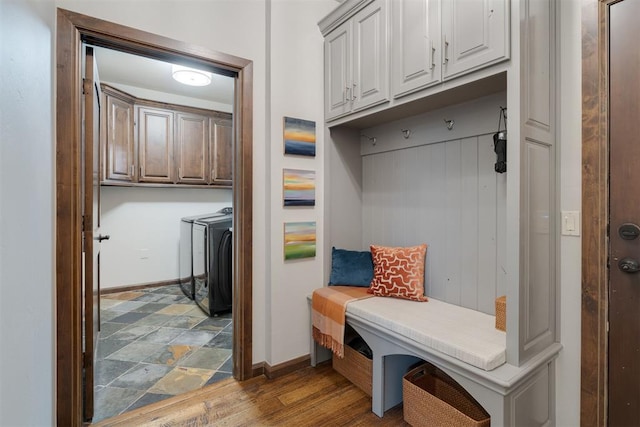 7616 NW 134th St, Oklahoma City, OK 73142 - mudroom featuring baseboards and washer and dryer