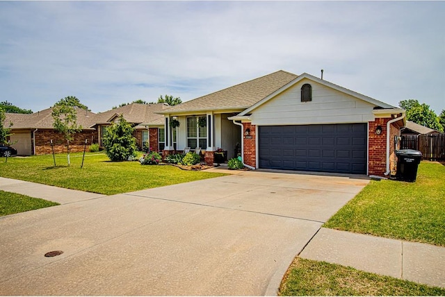 708 Ashwood Ln, Moore, OK 73160 - single story home featuring an attached garage, driveway, and brick siding