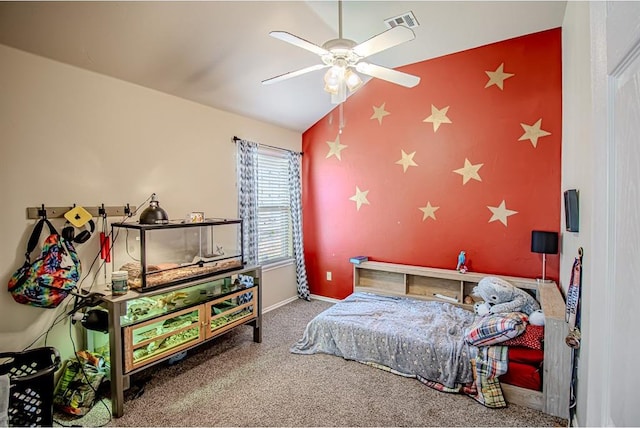 708 Ashwood Ln, Moore, OK 73160 - bedroom featuring carpet, vaulted ceiling, baseboards, ceiling fan, and an accent wall