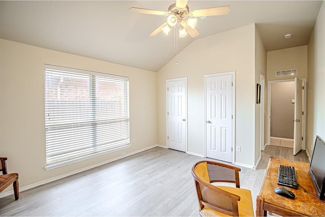 708 Ashwood Ln, Moore, OK 73160 - living area with ceiling fan, lofted ceiling, light wood finished floors, and baseboards