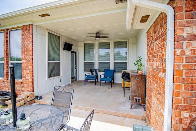708 Ashwood Ln, Moore, OK 73160 - view of patio with outdoor dining area and ceiling fan