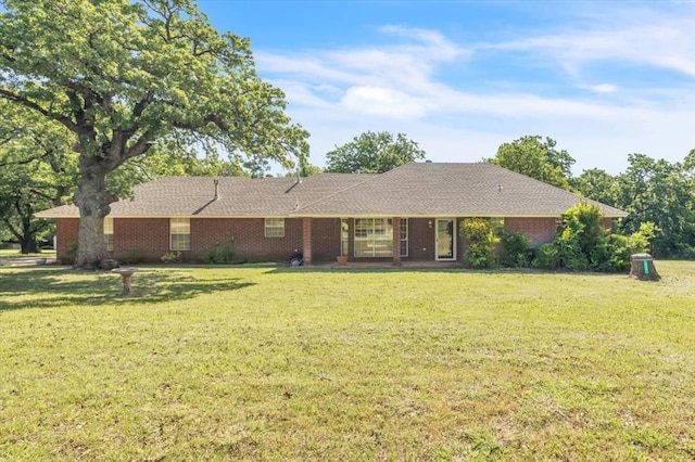 826 Stone Dr, Blanchard, OK 73010 - ranch-style home with a front yard and brick siding