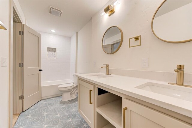 737 NW 89th St, Oklahoma City, OK 73114 - full bathroom featuring toilet, double vanity, recessed lighting, and  shower combination