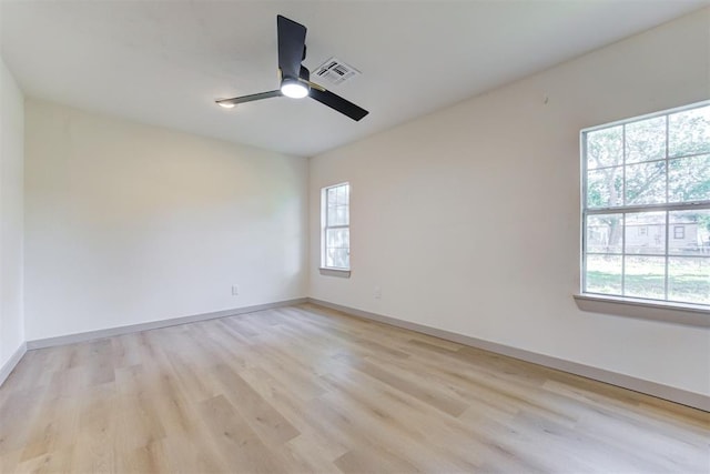 737 NW 89th St, Oklahoma City, OK 73114 - unfurnished room featuring ceiling fan, light wood-style flooring, and baseboards