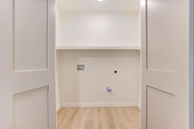 737 NW 89th St, Oklahoma City, OK 73114 - laundry room with electric dryer hookup, washer hookup, light wood finished floors, baseboards, and hookup for a gas dryer
