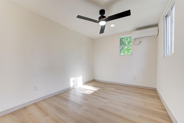 737 NW 89th St, Oklahoma City, OK 73114 - unfurnished room featuring a ceiling fan, a wall mounted AC, wood finished floors, baseboards, and recessed lighting