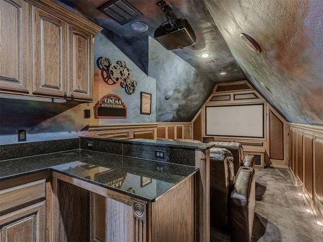 4401 Cannon Dr, Norman, OK 73072 - cinema room featuring a decorative wall and lofted ceiling