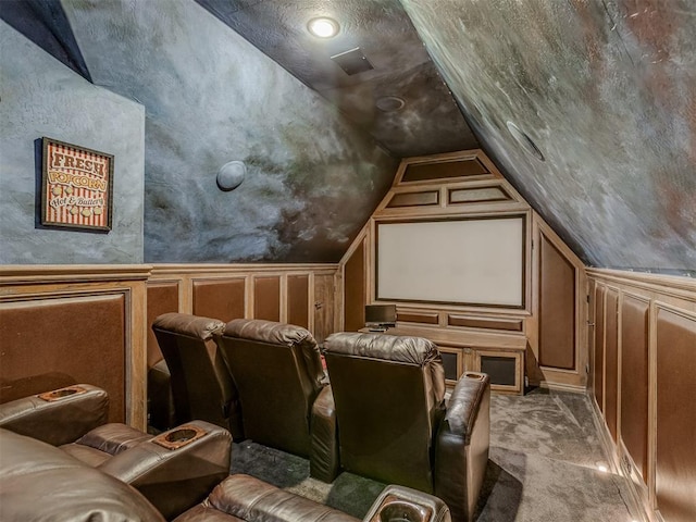 4401 Cannon Dr, Norman, OK 73072 - carpeted home theater room with a decorative wall and lofted ceiling