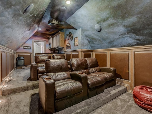 4401 Cannon Dr, Norman, OK 73072 - carpeted home theater with a decorative wall and vaulted ceiling