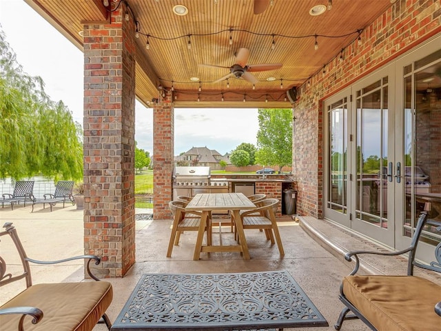 4401 Cannon Dr, Norman, OK 73072 - view of patio with french doors, area for grilling, a ceiling fan, and outdoor dining space