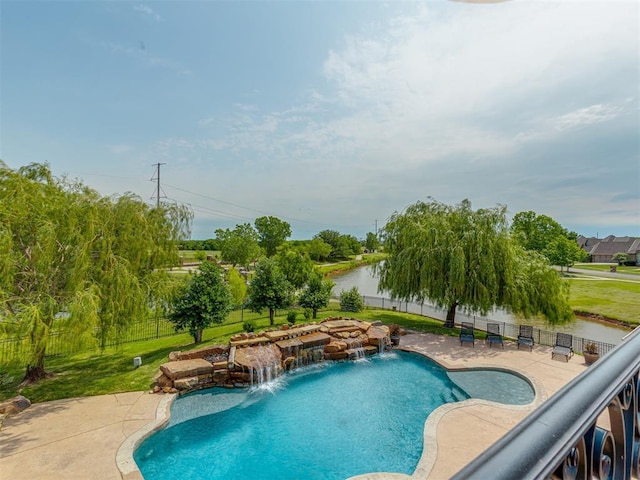 4401 Cannon Dr, Norman, OK 73072 - view of swimming pool featuring a fenced backyard, a patio, and a water view