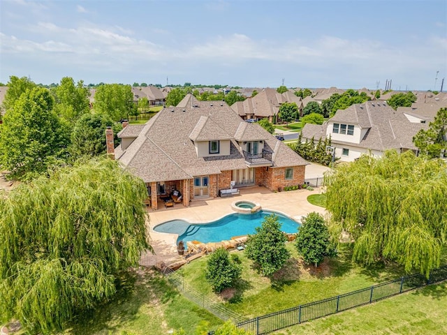 4401 Cannon Dr, Norman, OK 73072 - view of swimming pool featuring a fenced backyard, a patio, and a residential view