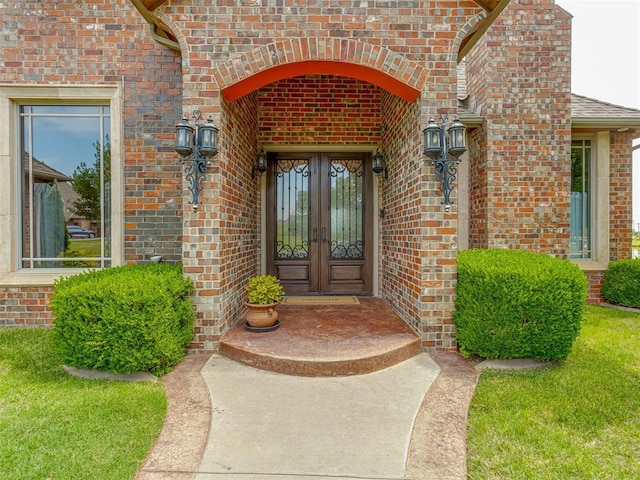 4401 Cannon Dr, Norman, OK 73072 - entrance to property featuring french doors and brick siding