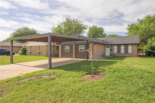 121 NW 79th St, Oklahoma City, OK 73114 - ranch-style house with brick siding, a front lawn, concrete driveway, and an attached carport