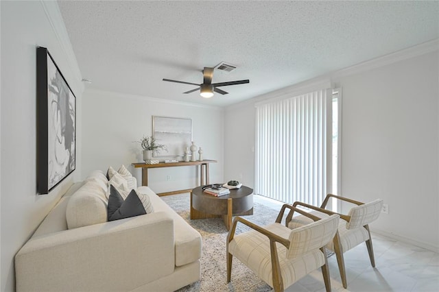 121 NW 79th St, Oklahoma City, OK 73114 - living room featuring crown molding, a ceiling fan, a textured ceiling, light marble finish flooring, and baseboards