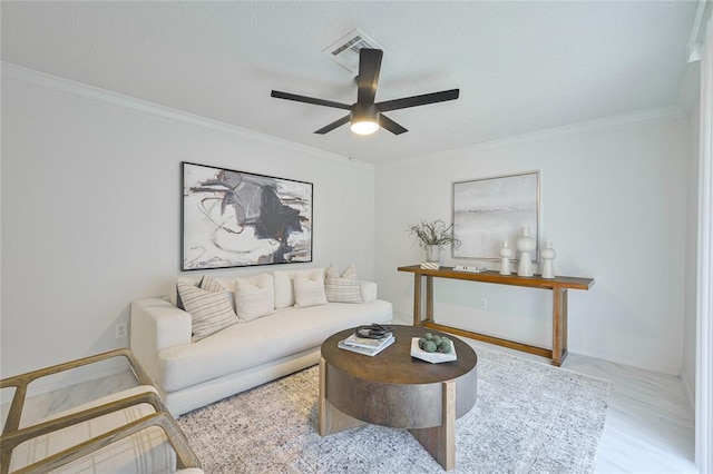 121 NW 79th St, Oklahoma City, OK 73114 - living area featuring ceiling fan and crown molding