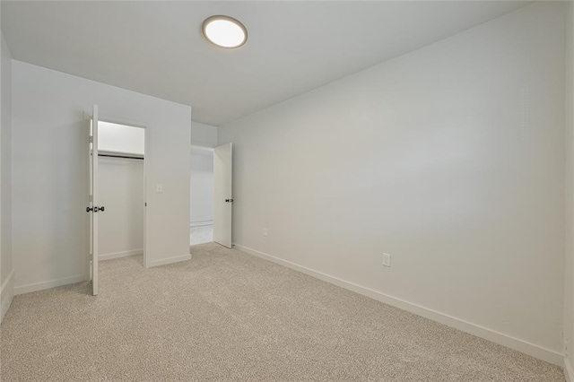 121 NW 79th St, Oklahoma City, OK 73114 - unfurnished bedroom featuring light carpet, baseboards, and a closet