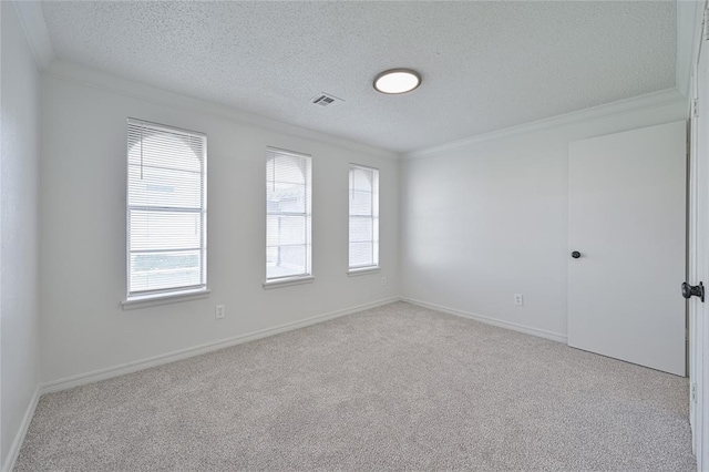 121 NW 79th St, Oklahoma City, OK 73114 - spare room with crown molding, carpet floors, a textured ceiling, and baseboards