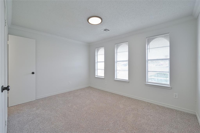 121 NW 79th St, Oklahoma City, OK 73114 - empty room featuring carpet flooring, crown molding, a textured ceiling, and baseboards