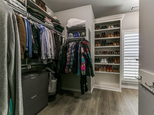 4133 Carmina Dr, Edmond, OK 73034 - spacious closet featuring wood finished floors
