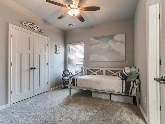 4133 Carmina Dr, Edmond, OK 73034 - carpeted bedroom featuring baseboards, ceiling fan, and a closet