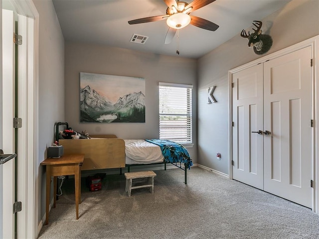 4133 Carmina Dr, Edmond, OK 73034 - carpeted bedroom with baseboards and a ceiling fan