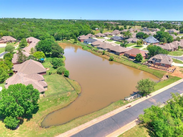 4133 Carmina Dr, Edmond, OK 73034 - aerial perspective of suburban area with a large body of water