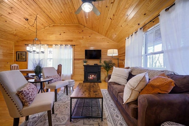 47 Sockeye Rd, Broken Bow, OK 74728 - living area featuring wooden walls, lofted ceiling, healthy amount of natural light, wooden ceiling, and ceiling fan