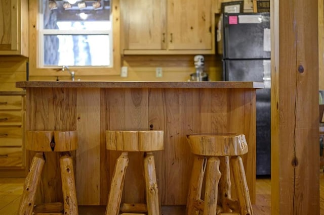 47 Sockeye Rd, Broken Bow, OK 74728 - kitchen featuring freestanding refrigerator