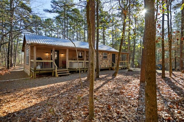 47 Sockeye Rd, Broken Bow, OK 74728 - view of front of property featuring covered porch and metal roof