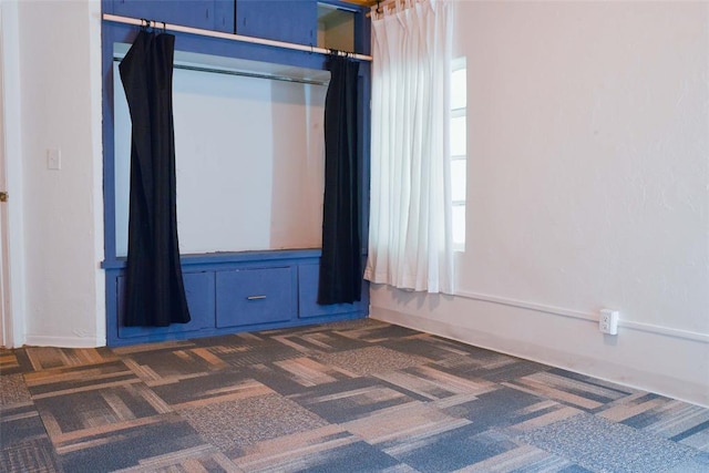 723 W Leslie St, Pauls Valley, OK 73075 - unfurnished room with dark carpet
