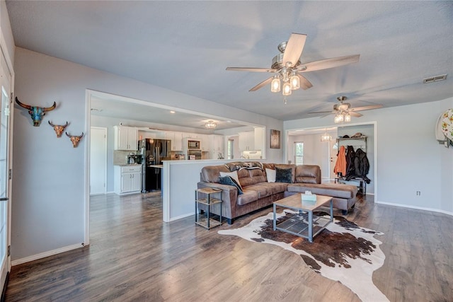 16070 N County Road 3264, Pauls Valley, OK 73075 - living room with ceiling fan, dark wood finished floors, and baseboards
