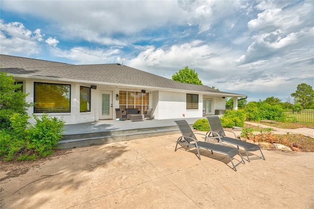 16070 N County Road 3264, Pauls Valley, OK 73075 - back of property featuring fence, a deck, a patio, and outdoor lounge area