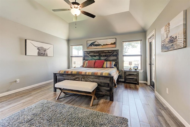 8624 Grey Wind Way, Arcadia, OK 73007 - bedroom with wood finished floors, lofted ceiling, baseboards, and a ceiling fan