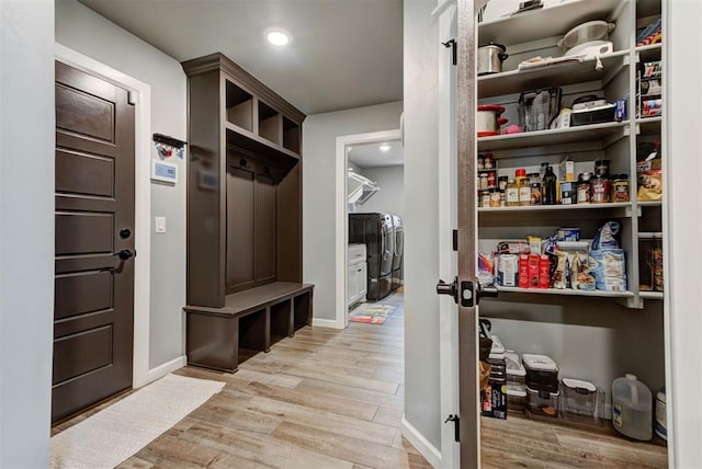 8624 Grey Wind Way, Arcadia, OK 73007 - mudroom with light wood-style flooring, baseboards, washer / clothes dryer, and recessed lighting