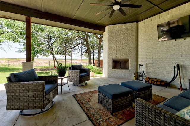 8624 Grey Wind Way, Arcadia, OK 73007 - view of patio featuring an outdoor living space with a fireplace and a ceiling fan