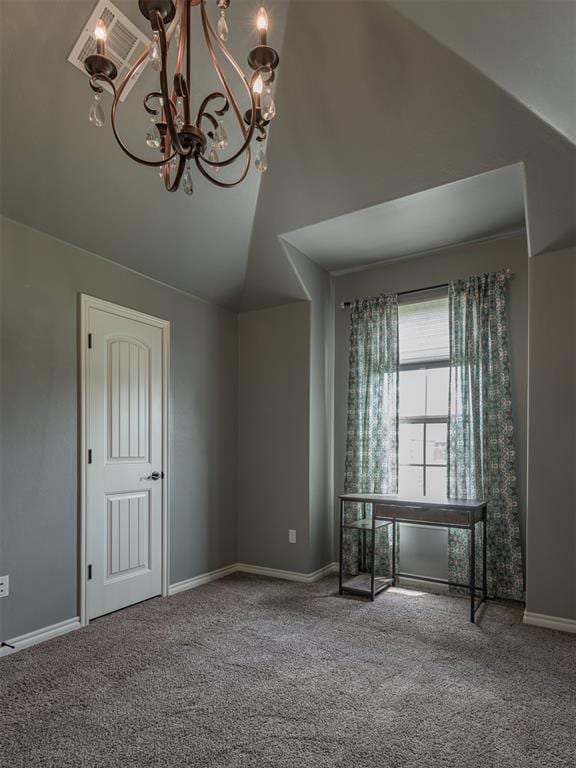 2145 Sycamore Creek Ave, Yukon, OK 73099 - spare room featuring a chandelier, carpet floors, baseboards, and high vaulted ceiling