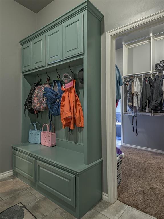 2145 Sycamore Creek Ave, Yukon, OK 73099 - mudroom featuring baseboards and light colored carpet