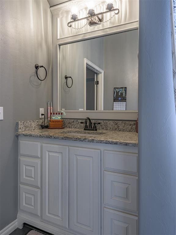2145 Sycamore Creek Ave, Yukon, OK 73099 - bathroom featuring vanity and baseboards
