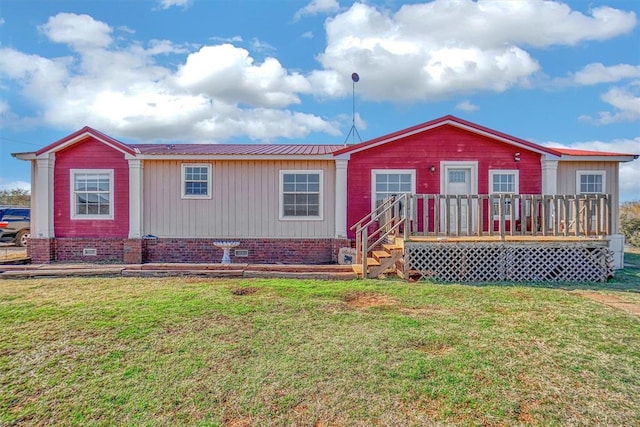 20930 E 1060th Rd, Canute, OK 73626 - ranch-style home featuring crawl space, a front yard, metal roof, and a wooden deck