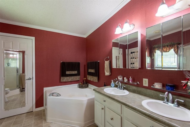 13351 El Zorro, Edmond, OK 73034 - full bathroom featuring a garden tub, double vanity, crown molding, a shower stall, and a textured ceiling