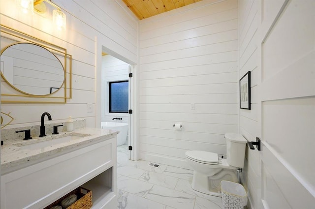177 Hochapine Trl, Broken Bow, OK 74728 - bathroom featuring wood walls, toilet, marble finish floors, vanity, and wood ceiling