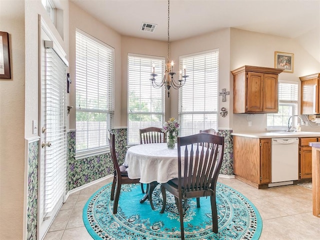 1512 Selborne Pl, Yukon, OK 73099 - dining space with a chandelier, light tile patterned flooring, and baseboards