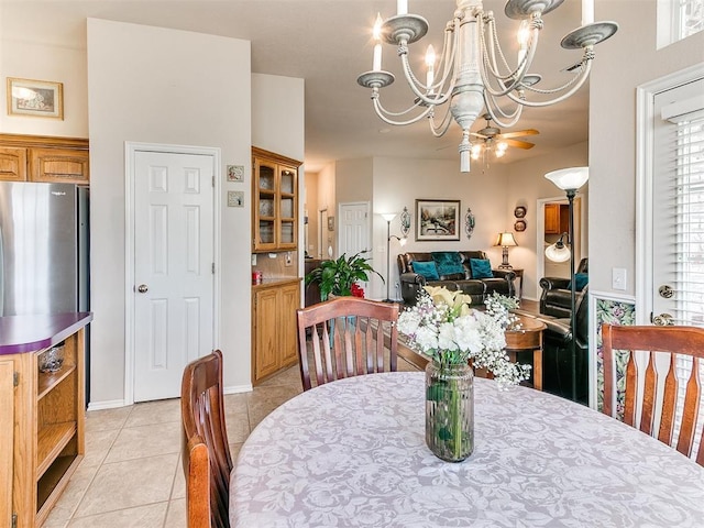 1512 Selborne Pl, Yukon, OK 73099 - dining room with a chandelier and light tile patterned flooring