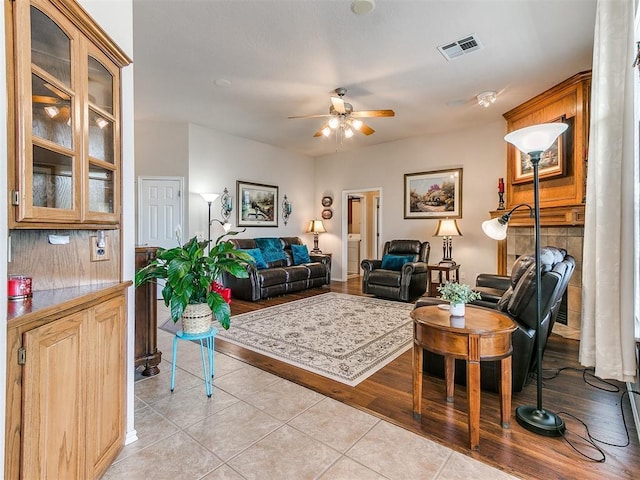 1512 Selborne Pl, Yukon, OK 73099 - living area with ceiling fan and light tile patterned flooring