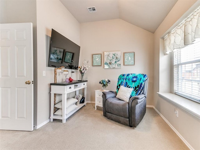 1512 Selborne Pl, Yukon, OK 73099 - sitting room featuring light colored carpet, lofted ceiling, and baseboards