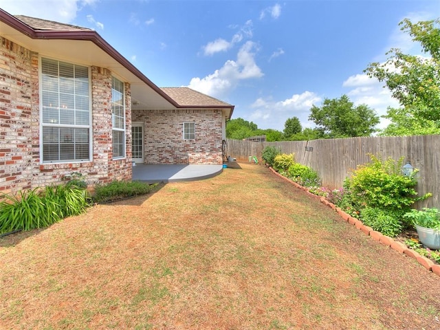 1512 Selborne Pl, Yukon, OK 73099 - view of yard with a patio area