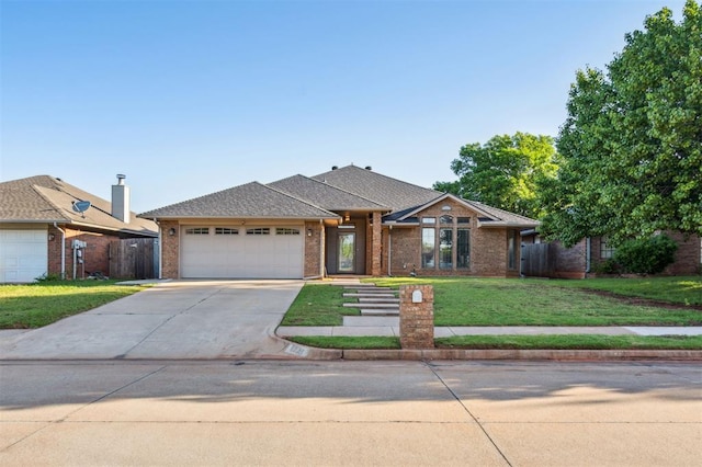 1721 Park View Pl, Edmond, OK 73003 - ranch-style home with an attached garage, brick siding, and concrete driveway