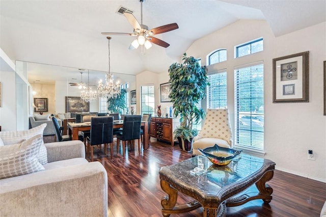1721 Park View Pl, Edmond, OK 73003 - living room featuring plenty of natural light, a ceiling fan, dark wood finished floors, a chandelier, and lofted ceiling