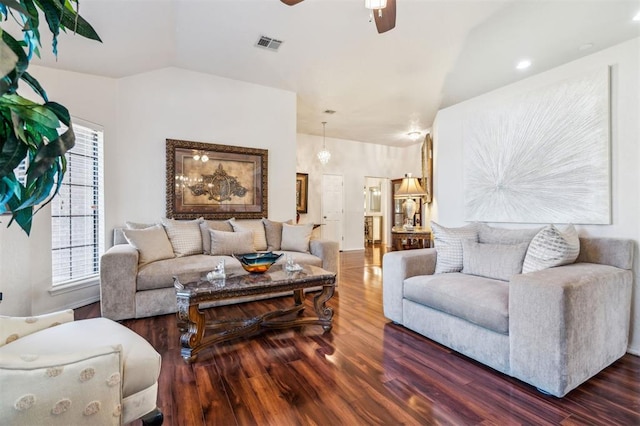 1721 Park View Pl, Edmond, OK 73003 - living room with wood finished floors, a ceiling fan, vaulted ceiling, and recessed lighting